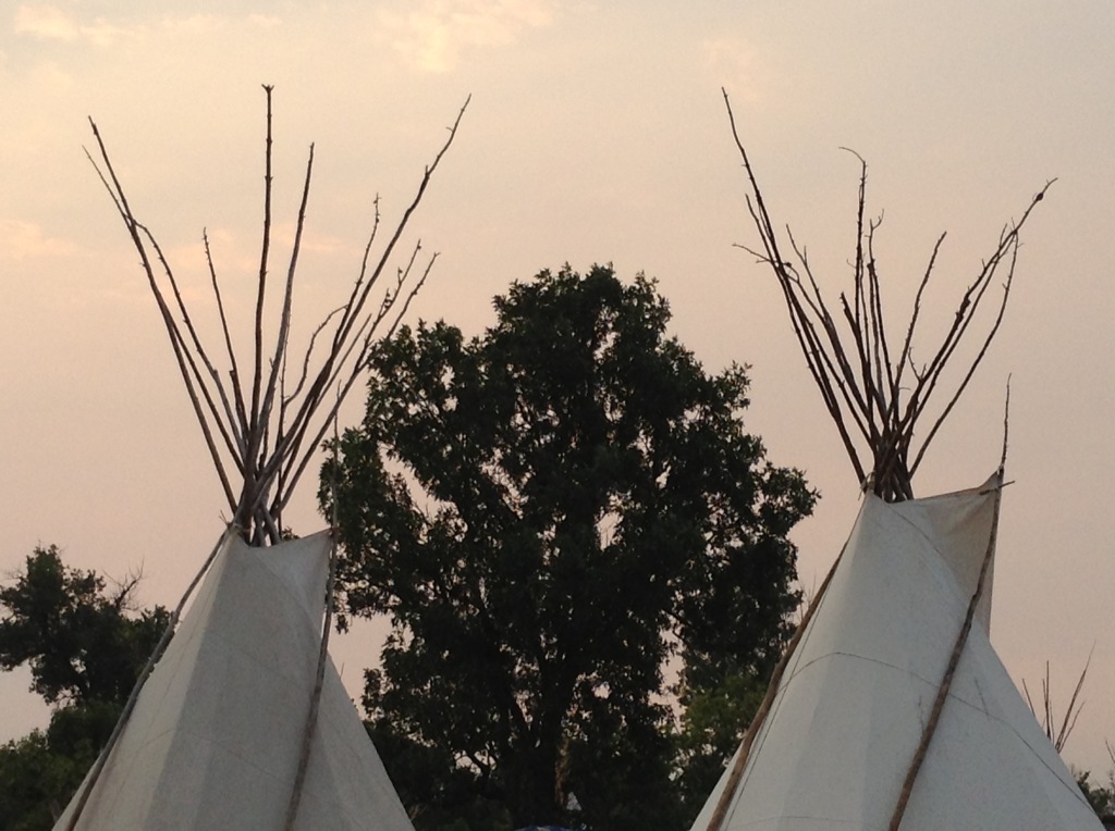 Two teepees at the Crow Fair and Powwow, Crow Agency, Montana. Copyright 2013, Kim Cotton.